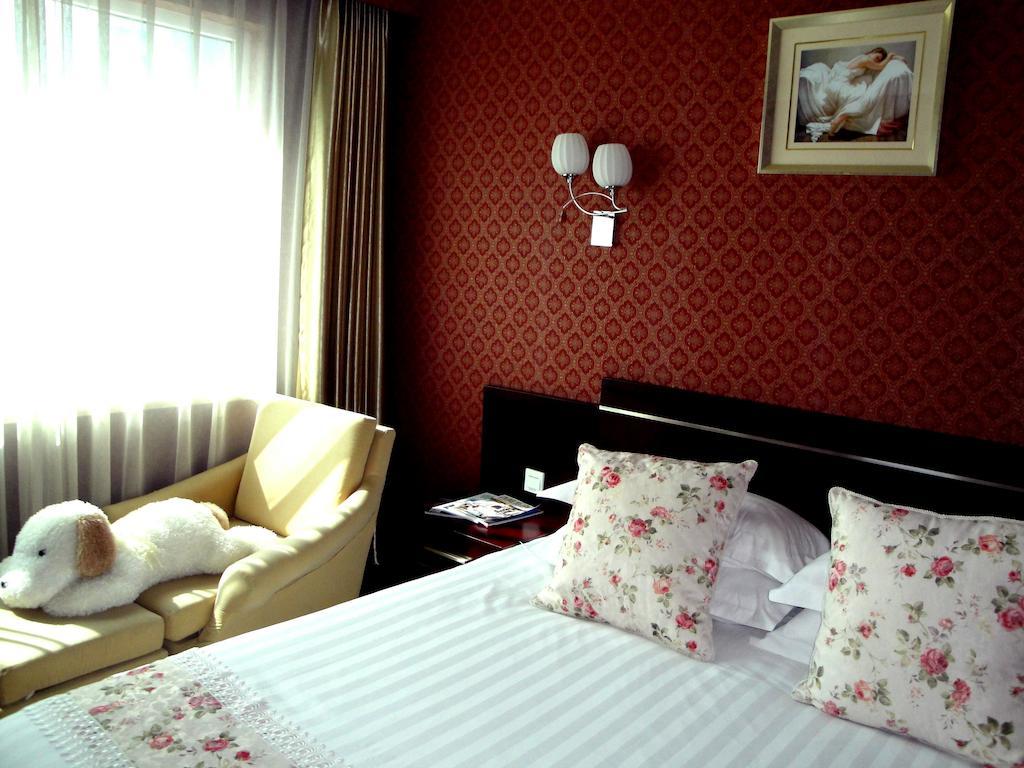 Overseas Chinese International Hotel Qingdao Exterior foto