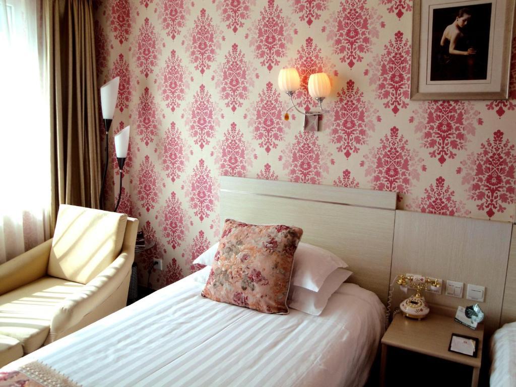 Overseas Chinese International Hotel Qingdao Habitación foto