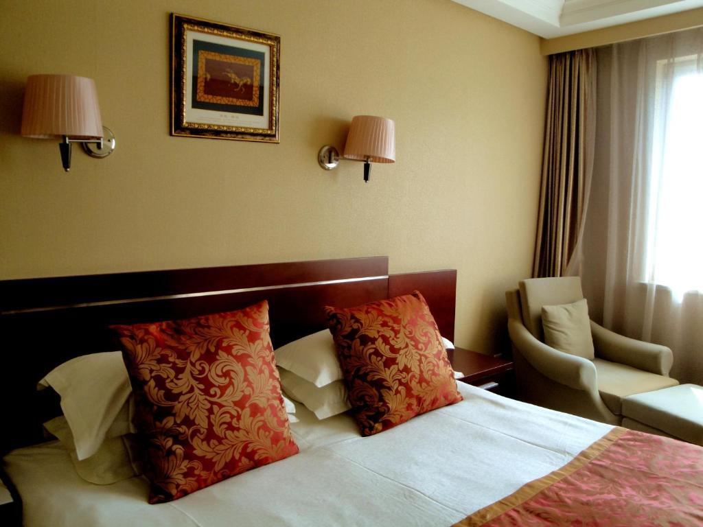 Overseas Chinese International Hotel Qingdao Habitación foto