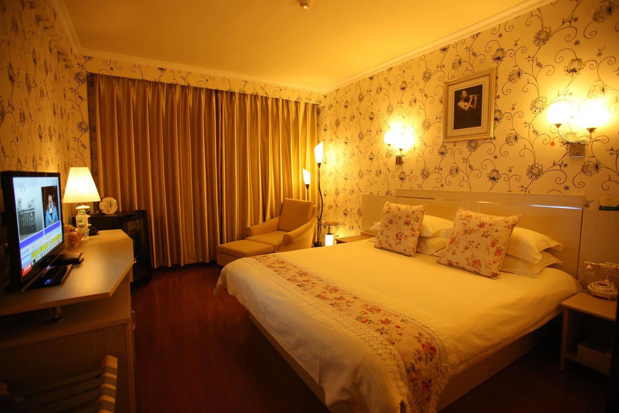 Overseas Chinese International Hotel Qingdao Exterior foto
